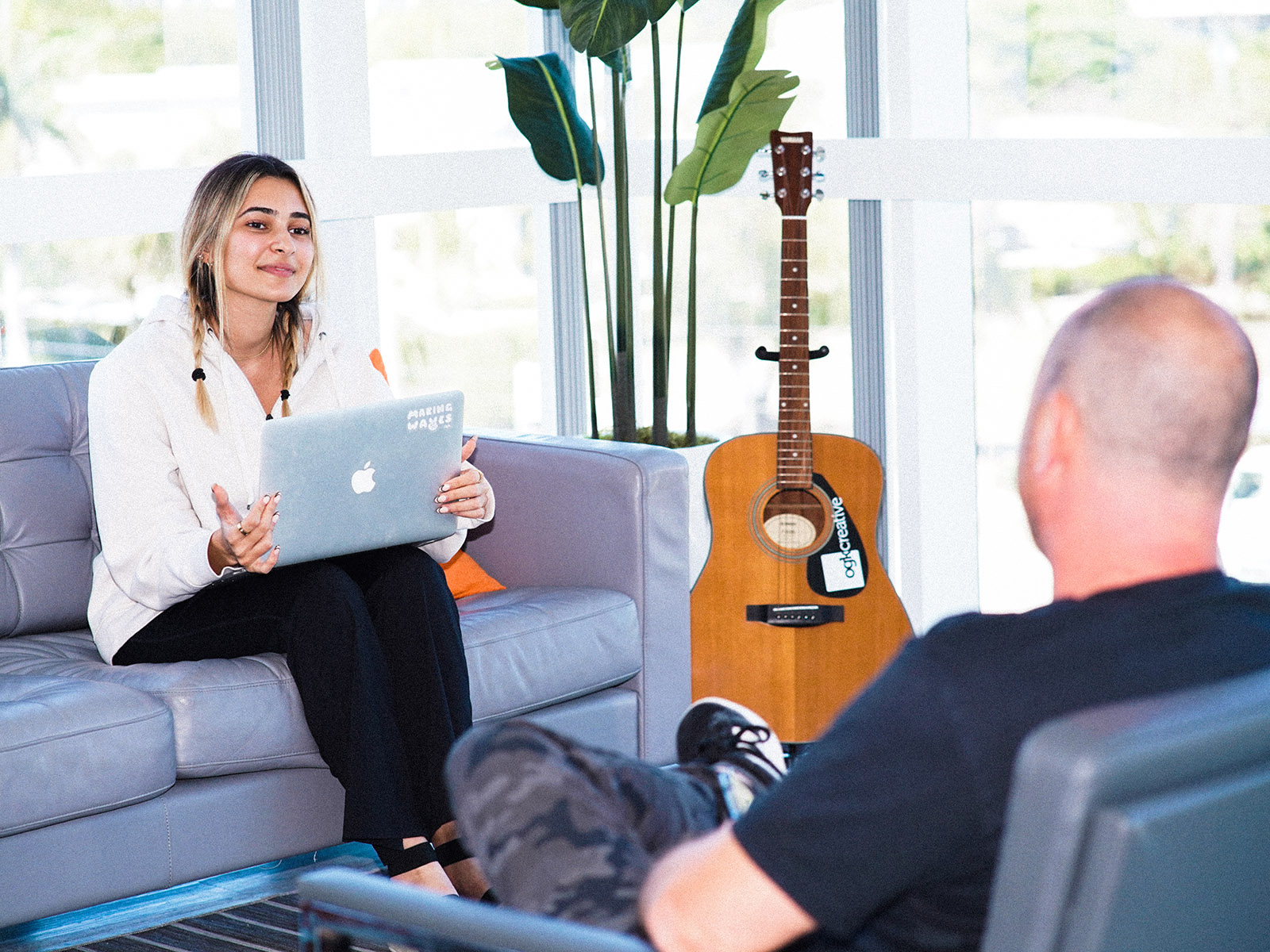 creative agency intern talking to ceo of company