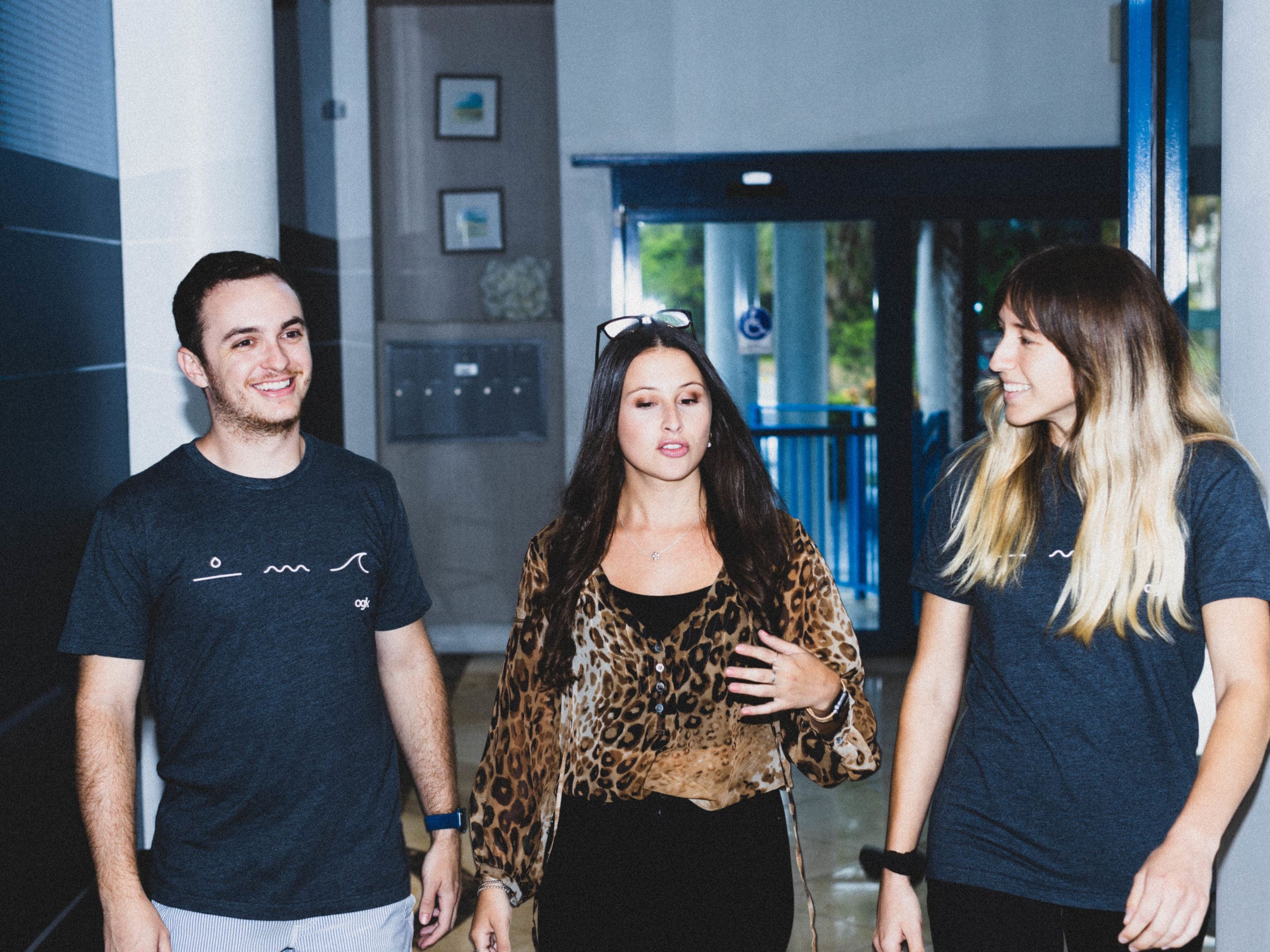 new employee talking to coworkers on first day on the new job